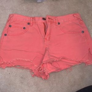 Free People high waisted coral frayed Jean shorts